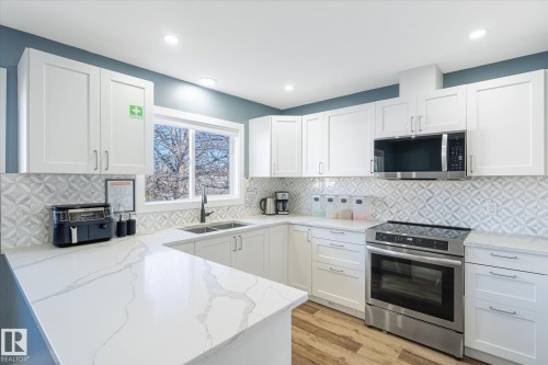 12707 92 Street, Edmonton, AB - Indoor Photo Showing Kitchen With Double Sink