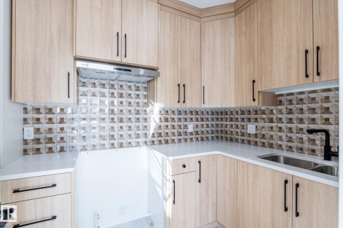 2003 154 Avenue, Edmonton, AB - Indoor Photo Showing Kitchen With Double Sink