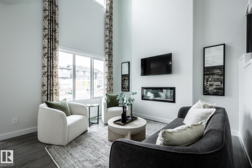 5017 Cawsey Link, Edmonton, AB - Indoor Photo Showing Living Room With Fireplace