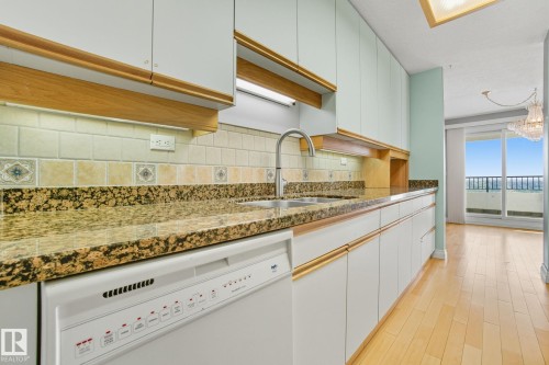 1602 12303 Jasper Avenue Nw, Edmonton, AB - Indoor Photo Showing Kitchen With Double Sink