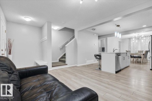 1248 Rosenthal Boulevard, Edmonton, AB - Indoor Photo Showing Living Room With Fireplace
