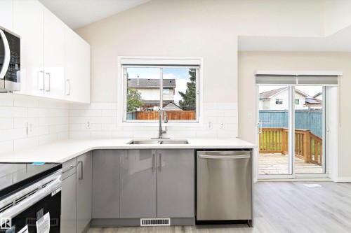 12828 144 Avenue, Edmonton, AB - Indoor Photo Showing Kitchen With Double Sink With Upgraded Kitchen