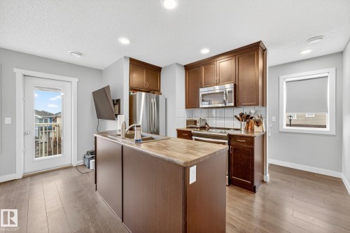 15 17832 78 Street, Edmonton, AB - Indoor Photo Showing Kitchen With Double Sink