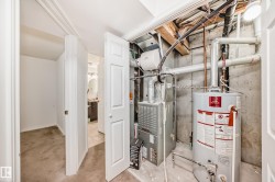 Utilities featuring gas water heater and heating unit - 