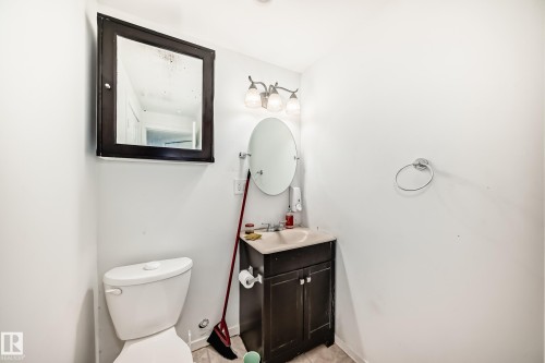 Bathroom with vanity and toilet - #48 - 2503 24 Street Nw, Edmonton, AB - Indoor Photo Showing Bathroom
