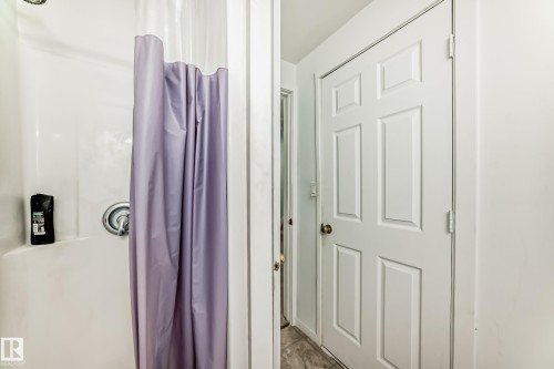 Bathroom featuring a shower stall - #48 - 2503 24 Street Nw, Edmonton, AB - Indoor Photo Showing Bathroom
