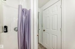 Bathroom featuring a shower stall - 