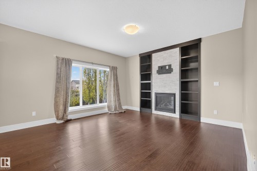 3642 Claxton Place, Edmonton, AB - Indoor Photo Showing Living Room With Fireplace