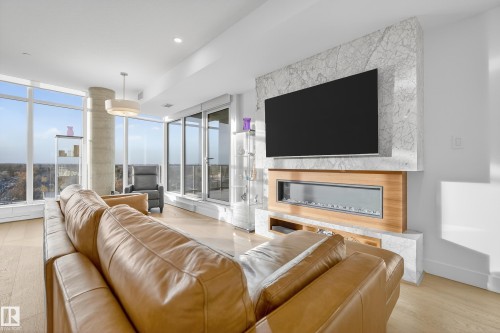 602 14105 West Block Drive, Edmonton, AB - Indoor Photo Showing Living Room With Fireplace