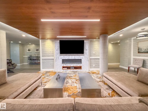 602 14105 West Block Drive, Edmonton, AB - Indoor Photo Showing Living Room With Fireplace