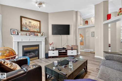 55 Mcleod Crescent, Leduc, AB - Indoor Photo Showing Living Room With Fireplace