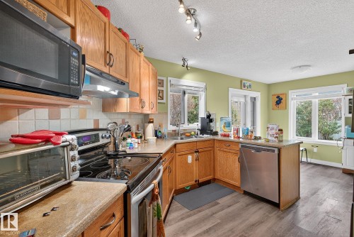 55 Mcleod Crescent, Leduc, AB - Indoor Photo Showing Kitchen With Double Sink