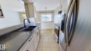 718 25 Street, Wainwright, AB  - Indoor Photo Showing Kitchen With Double Sink 