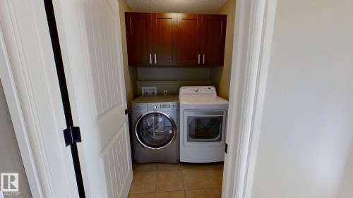 718 25 Street, Wainwright, AB - Indoor Photo Showing Laundry Room