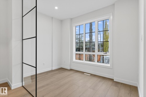 7711 95 Avenue, Edmonton, AB - Indoor Photo Showing Other Room