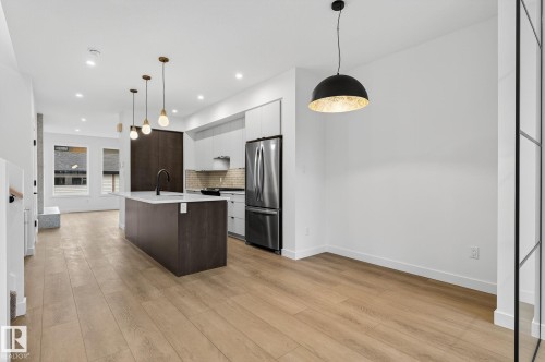 7711 95 Avenue, Edmonton, AB - Indoor Photo Showing Kitchen With Upgraded Kitchen