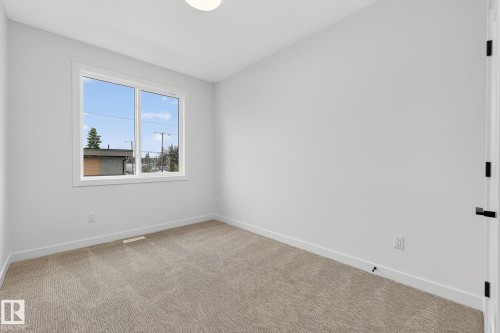 7711 95 Avenue, Edmonton, AB - Indoor Photo Showing Other Room