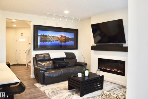 38 Wiltree Terrace, Fort Saskatchewan, AB - Indoor Photo Showing Living Room With Fireplace