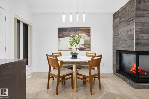11434 71 Avenue, Edmonton, AB - Indoor Photo Showing Dining Room With Fireplace