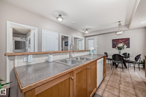 101 8619 111 Street, Edmonton, AB - Indoor Photo Showing Kitchen With Double Sink