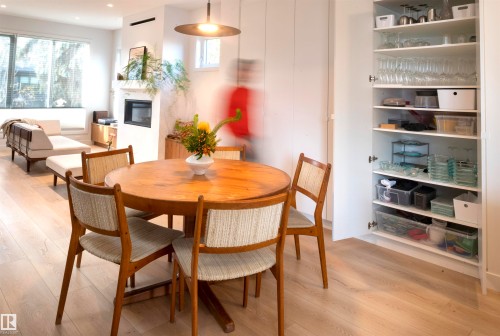 11211 61 Street, Edmonton, AB - Indoor Photo Showing Dining Room With Fireplace