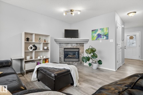 137 Rue Magnan, Beaumont, AB - Indoor With Fireplace