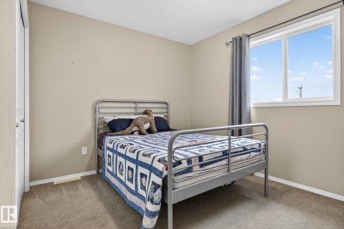 137 Rue Magnan, Beaumont, AB - Indoor Photo Showing Bedroom