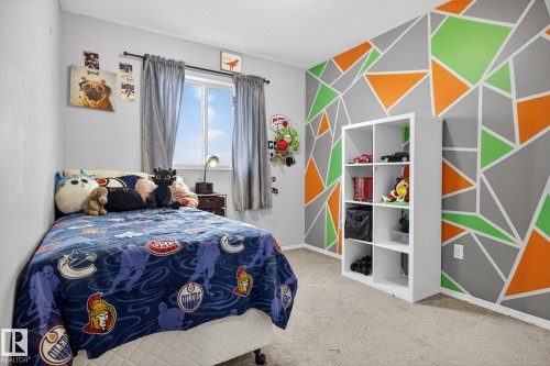 137 Rue Magnan, Beaumont, AB - Indoor Photo Showing Bedroom