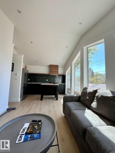 10711 76 Avenue, Edmonton, AB - Indoor Photo Showing Living Room