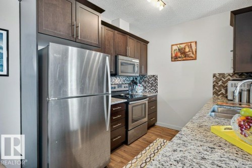 329 503 Albany Way, Edmonton, AB - Indoor Photo Showing Kitchen With Stainless Steel Kitchen