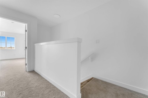 19 7110 Keswick Cm Sw, Edmonton, AB - Indoor Photo Showing Other Room