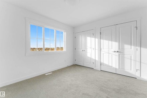 19 7110 Keswick Cm Sw, Edmonton, AB - Indoor Photo Showing Other Room