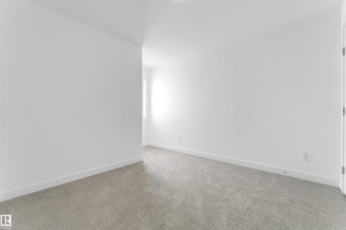 19 7110 Keswick Cm Sw, Edmonton, AB - Indoor Photo Showing Other Room