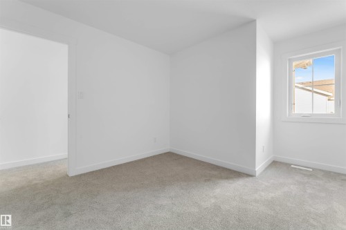 19 7110 Keswick Cm Sw, Edmonton, AB - Indoor Photo Showing Other Room