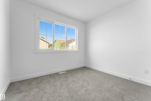 19 7110 Keswick Cm Sw, Edmonton, AB - Indoor Photo Showing Other Room