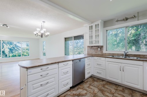 Edmonton, AB - Indoor Photo Showing Kitchen With Double Sink