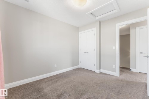 9 Spring Link, Spruce Grove, AB - Indoor Photo Showing Other Room