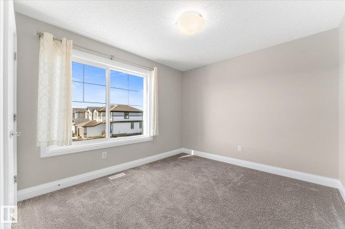 9 Spring Link, Spruce Grove, AB - Indoor Photo Showing Other Room