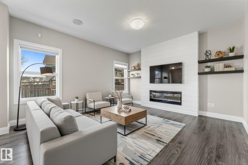 9 Spring Link, Spruce Grove, AB - Indoor Photo Showing Living Room With Fireplace