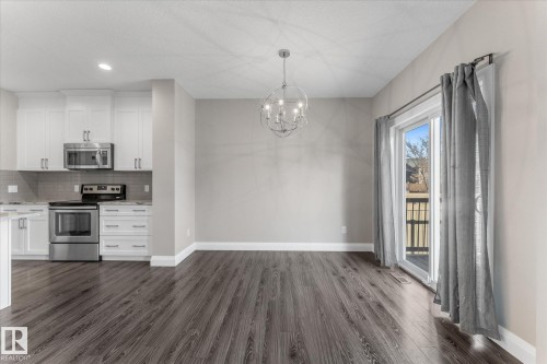 9 Spring Link, Spruce Grove, AB - Indoor Photo Showing Kitchen With Stainless Steel Kitchen With Upgraded Kitchen