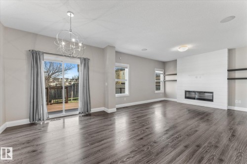 9 Spring Link, Spruce Grove, AB - Indoor Photo Showing Living Room With Fireplace