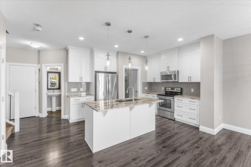 9 Spring Link, Spruce Grove, AB - Indoor Photo Showing Kitchen With Stainless Steel Kitchen With Upgraded Kitchen