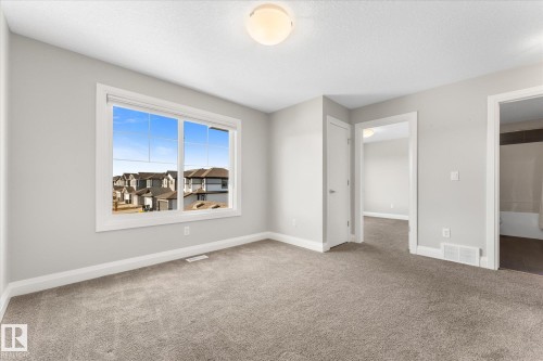 9 Spring Link, Spruce Grove, AB - Indoor Photo Showing Other Room