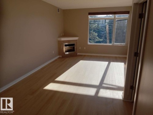 301 11140 68 Avenue Nw, Edmonton, AB - Indoor With Fireplace
