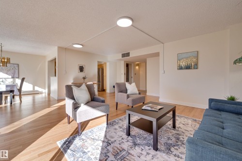 205 8340 Jasper Avenue, Edmonton, AB - Indoor Photo Showing Living Room