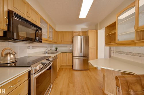 205 8340 Jasper Avenue, Edmonton, AB - Indoor Photo Showing Kitchen With Stainless Steel Kitchen