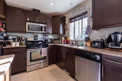 52 1150 Windermere Way, Edmonton, AB - Indoor Photo Showing Kitchen With Double Sink