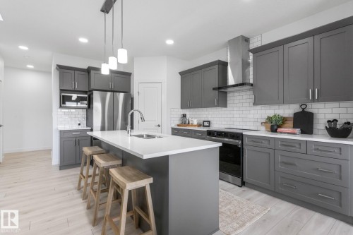 5019 Cawsey Link, Edmonton, AB - Indoor Photo Showing Kitchen With Double Sink With Upgraded Kitchen