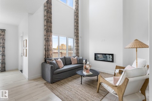 5019 Cawsey Link, Edmonton, AB - Indoor Photo Showing Living Room With Fireplace
