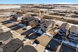 Aerial overview of property's location with nearby suburban area - 